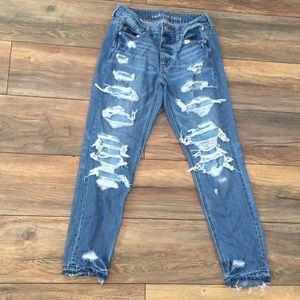 Ripped denim mom jeans with patches